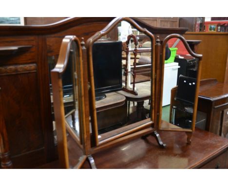 A mahogany framed tryptic dressing table mirror, shaped plates