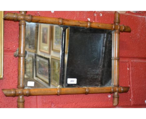 A Victorian bamboo mirror