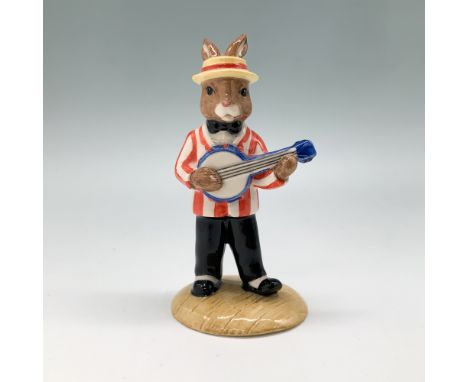 This charming Royal Doulton Bunnykins figurine, titled "Banjo Player," is part of the Jazz Band Collection. Designed by artis