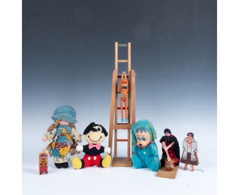 Magnificent set of toys that includes an acrobatic man that swings if you squeeze the wooden handles, a ladder with a figurin