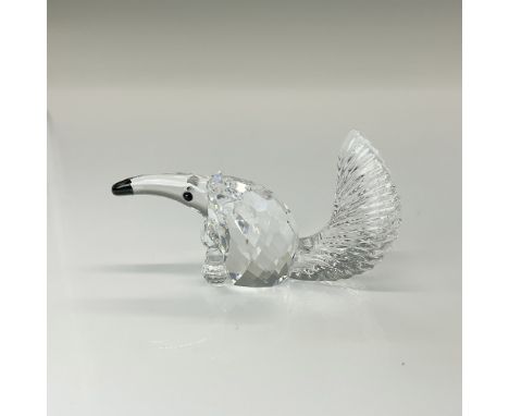 Clear crystal anteater with a faceted body and molded tail. Part of the Endangered Species collection. Swarovski backstamp. T