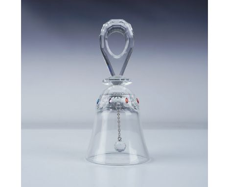 This Swarovski Crystal Solaris Table Bell features a beautifully faceted handle and a clear bell adorned with multicolored cr