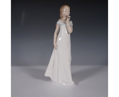 Lladro figurine "A Special Occasion" (#8213) (Una Velada Especial), designed by Francisco Polope, was issued in 2006 and reti
