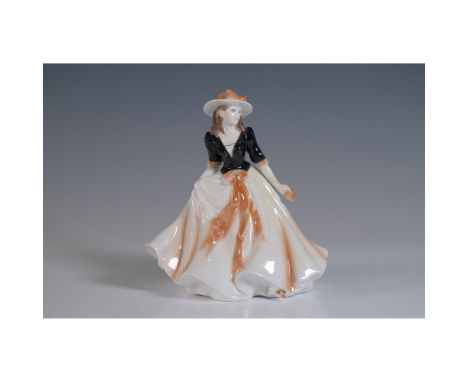 A fine Royal Worcester porcelain figurine titled Caroline from the Les Petites collection. Designed with intricate detailing,