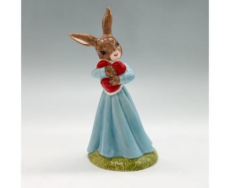 Royal Doulton Bunnykins figurine titled Love Heart from The Occasions Collection, DB288. This fine bone china piece is hand-m