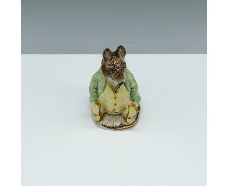Glossy porcelain figure modeling a yellow and green three piece suit. Royal Albert Beatrix Potter backstamp. This item has it