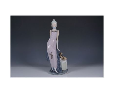 An elegant Lladro porcelain figurine titled Couplet Lady (model number 01005174), handcrafted in Spain. This sophisticated pi