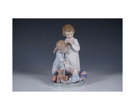 This delightful piece features two children joyfully admiring their Christmas gifts, including a teddy bear, doll, toy plane,
