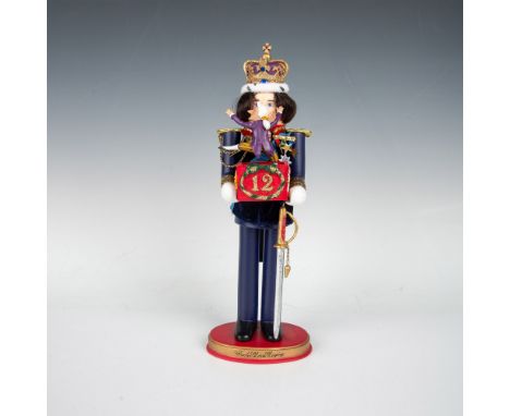 Handcrafted and hand painted Christmas figure. Depicts King George VI, reign from 1936-1952, holding a box for Twelve Lords L