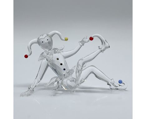 Presenting a delightful Swarovski Crystal Jester figurine, crafted with exceptional detail and precision. This playful piece 