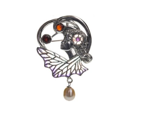 ART NOUVEAU STYLE PLIQUE A JOUR BROOCH, depicting a female in profile facing left, with two round garnets and a cabochon ruby