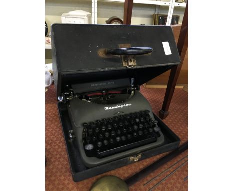 A mid 20th century Remington Rand portable typewriter in original case.