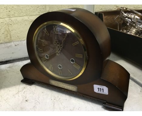 An Art Deco mahogany cased mantle clock.