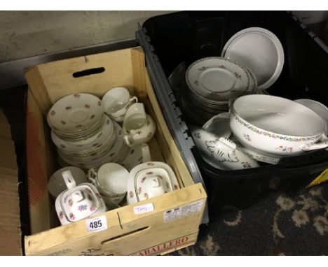 The residue of a china tea service decorated with rose buds together with the residue of a Bridgwood china dinner service.