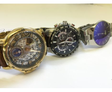 A Citizen eco-dive chronometer wristwatch together with two others.
(R51, R6, R30)