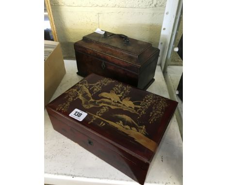 An early 19th century walnut tea caddy with line inlay together with a red lacquer wood jewellery box decorated with birds in