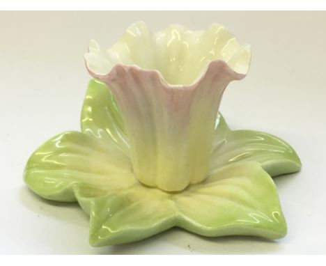An early 20th century Royal Worcester posy vase modelled as a daffodil (G103).