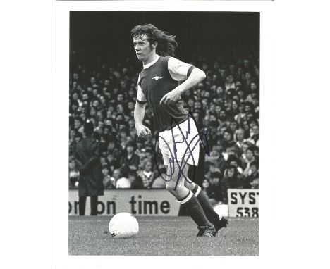 Liam Brady Signed Arsenal Football 8x10 Photo. Good Condition. All signed items come with our certificate of authenticity. We