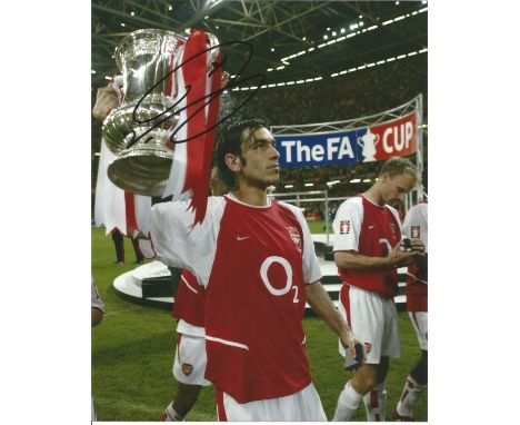 Robert Pires Signed Arsenal Fa Cup Football 8x10 Photo. Good Condition. All signed items come with our certificate of authent