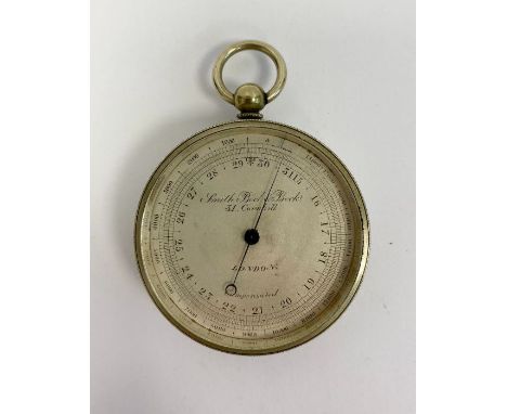 White metal cased compensated pocket barometer produced by Smith, Beck & Becks of London, with silvered dial, 5.3cm diam. 