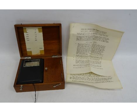Early 20th century French self recording pocket barometer, the black case with viewing window enclosing plated clockwork mech