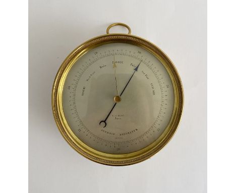 Early 20th century brass cased aneroid barometer by E.J. Dent (Paris), the silvered dial numbered 24379, 12.2cm diam.&nbsp;