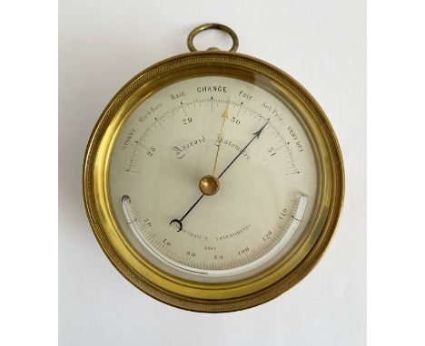 Late 19th century brass cased aneroid barometer,&nbsp;the silvered dial with thermometer, 12cm diam,&nbsp;