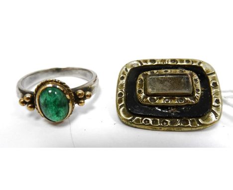 Late Georgian gold and black enamel memorial brooch, oblong and engraved and a white metal ring set cabochon emerald in gold-