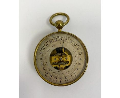 Late 19th century French brass cased pocket open faced barometer, the silvered dial with logo R in a diamond, with central sk