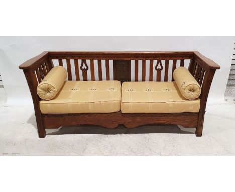 Arts &amp; Crafts oak three-piece suite&nbsp;comprising twin-seat settee and pair of armchairs, the settee of rectangular for