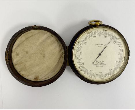 Mid-late 19th century brass-cased Baker compensated pocket barometer, the dial marked Baker no. 1064/Optician/High Holborn, i