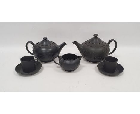 Group of 20th century Wedgwood black basalt teawares, impressed marks, comprising two teapots and covers in sizes, a sugar bo