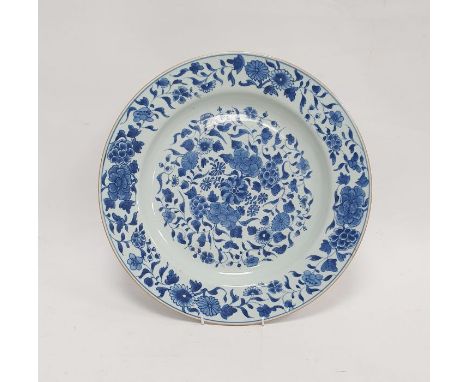 18th/19th century Chinese porcelain charger with underglaze blue decoration of scrolling foliage, peony and other blossoms, 3