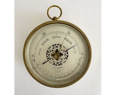 Late 19th/early 20th century brass cased Callaghan (London) barometer,&nbsp; with pierced silvered dial and thermometer, with
