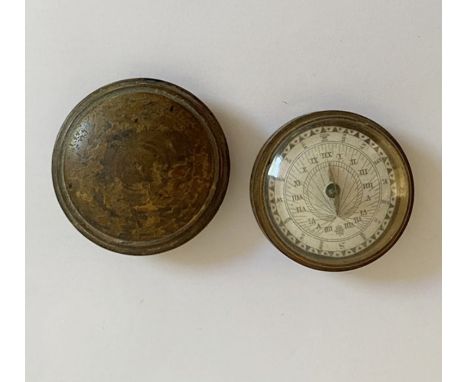 Travelling sundial/compass&nbsp;within a small leather screw-top caseCondition ReportCase has surface scratches and scuffs. l