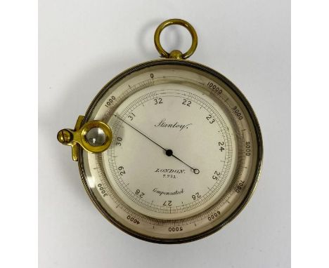 Brass cased Stanley of London compensated pocket barometer, circa 1900, with attached magnifying lens, the silvered dial numb