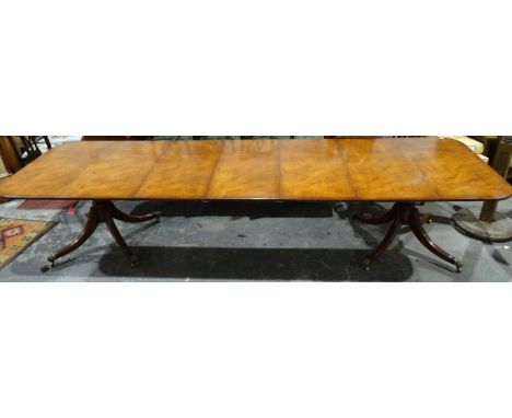 Good quality reproduction Regency mahogany extending dining table by Barry Cotton&nbsp;with three leaves, on twin pedestal su