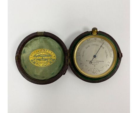 Negretti & Zambra brass cased pocket barometer, the silvered dial marked 20505, in leather case,  (lacking inner ring), 4.6cm
