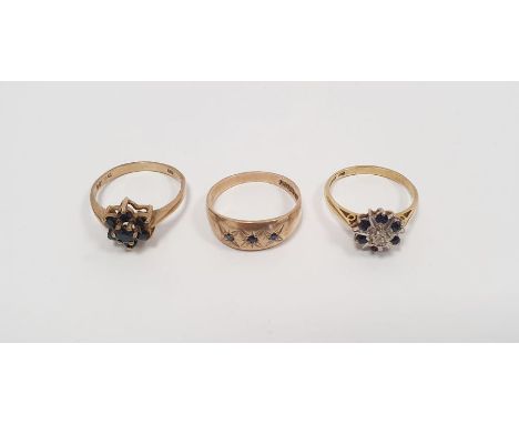 18ct gold cluster ring set with white and black stones, 2.5g, 9ct gold ring set with three small sapphires, 2g and 9ct gold a