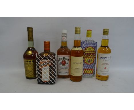 Six bottles of assorted spirits to include Cointreau (one litre), Gordon's Gin, Jim Beam, Hine Signature cognac and two bottl