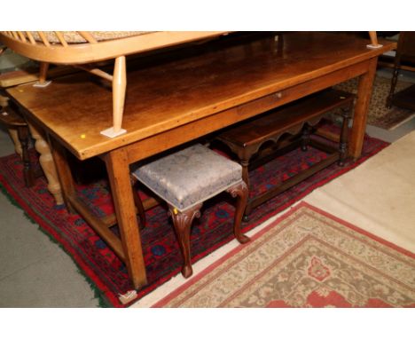 A 19th century light oak plank top refectory table, on chamfered and stretchered supports, top 33" x 74"