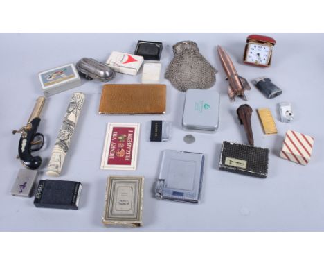 A number of cigarette lighters by Zippo and others, playing cards and other collectables