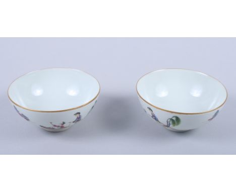 A pair of Chinese porcelain enamel bowls on white scale ground with boat and figure decoration, gilt rim and marks to base, 4