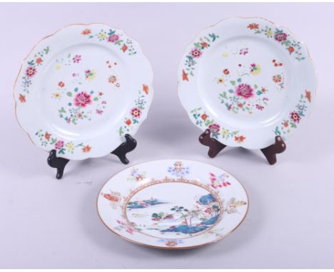 An 18th century Chinese enamel landscape decorated plate, 9" dia (rim chip) and a pair of 18th century Canton floral enamel s