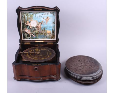 A walnut cased Polyphon music box with twenty disks approx Condition: Plays sporadically, stalls, pauses when playing. Two te