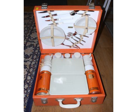 A 1960s Sirram picnic set, in case