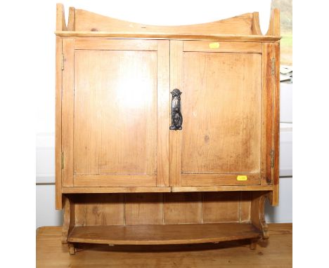 A waxed pine wall cupboard enclosed two doors with shelf over, 22" wide x 28" high