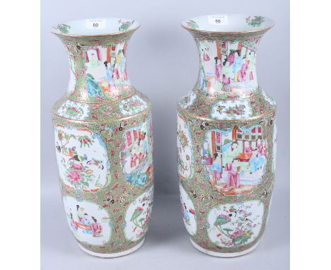 A pair of Canton enamel famille vert rouleau vases with figured panels, 17 1/2" high (one drilled as a lamp)Condition: Losses