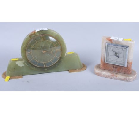 An Art Deco green onyx cased mantel clock and a smaller alabaster cased barometer