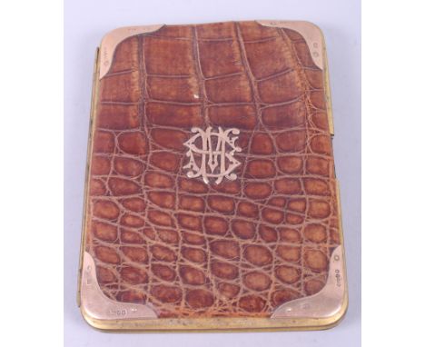 A Victorian crocodile skin card case with 9ct gold corners and initials
